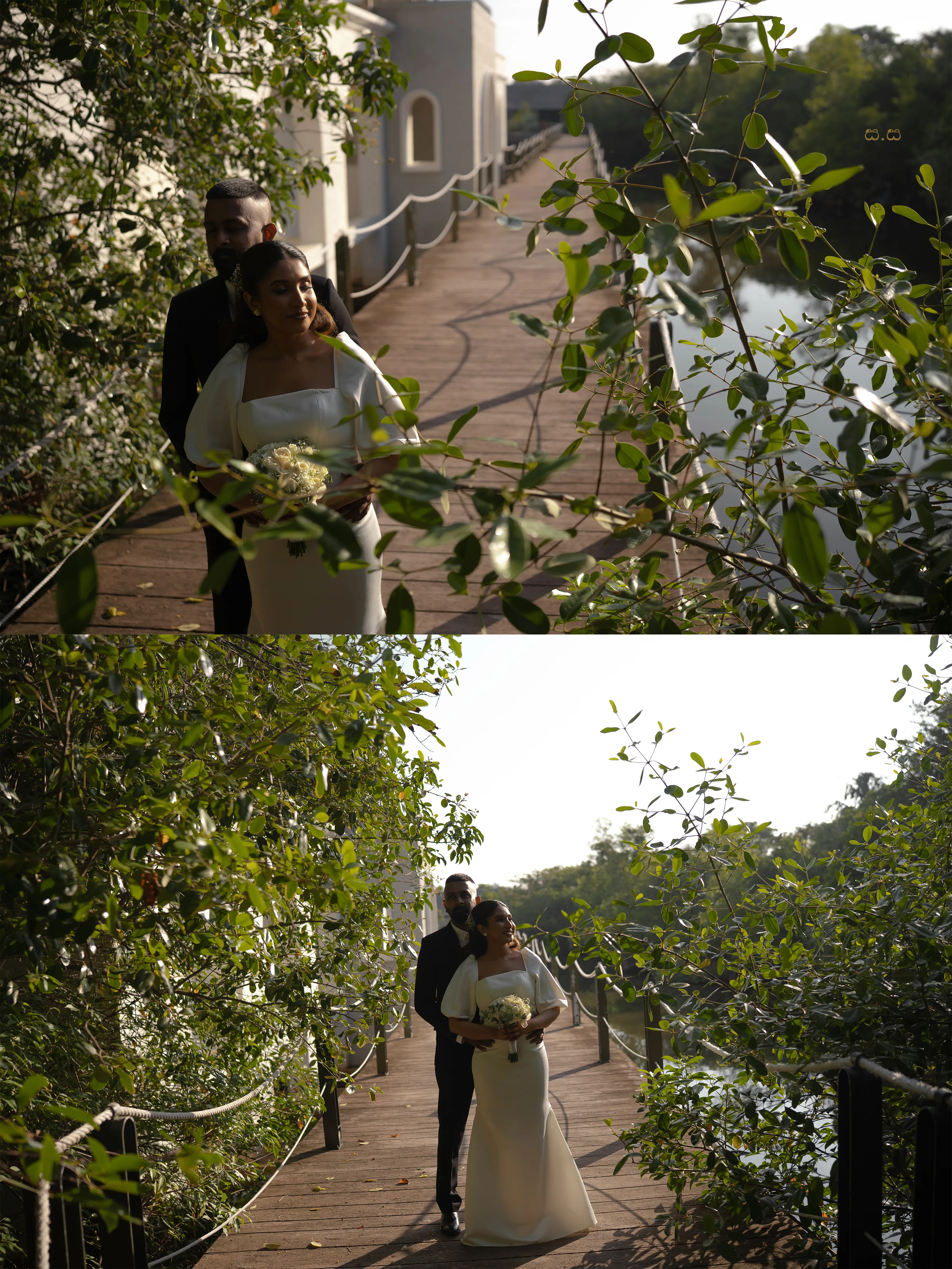 The newlyweds walk together through greenery beside the white residence.