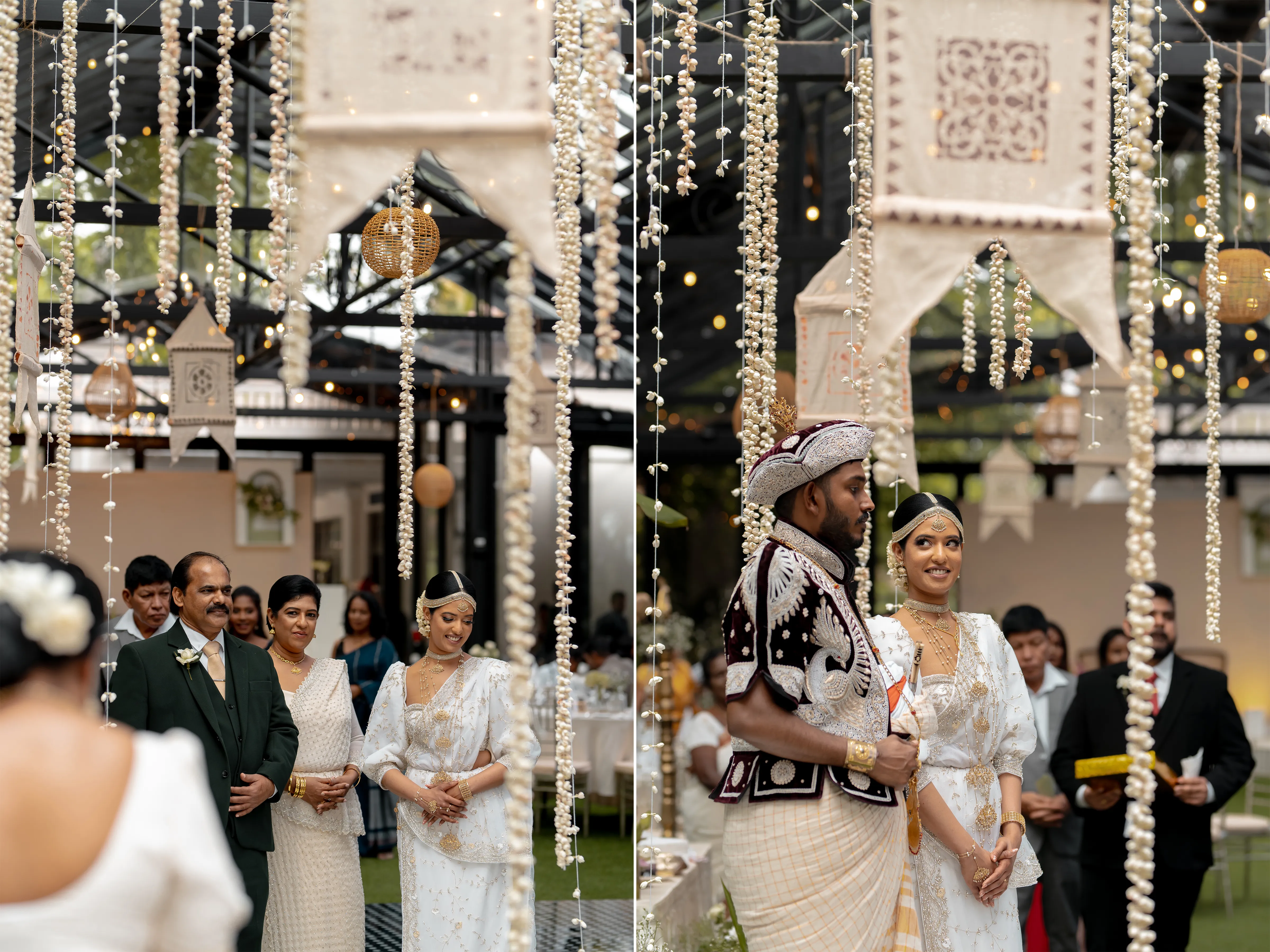 The newlyweds walk with family beneath strings of white flowers.